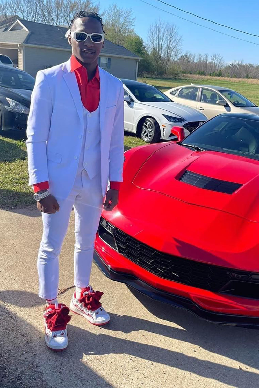 White and 2024 red prom suit